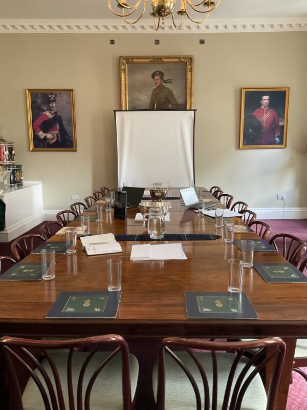 The main table in the colonel's room, set up for a meeting